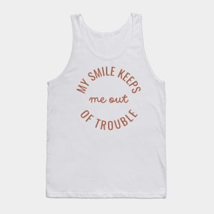 My smile keeps me out of trouble Tank Top